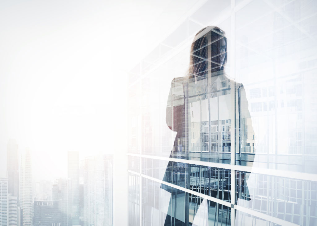 Techwoman superimposed on a building