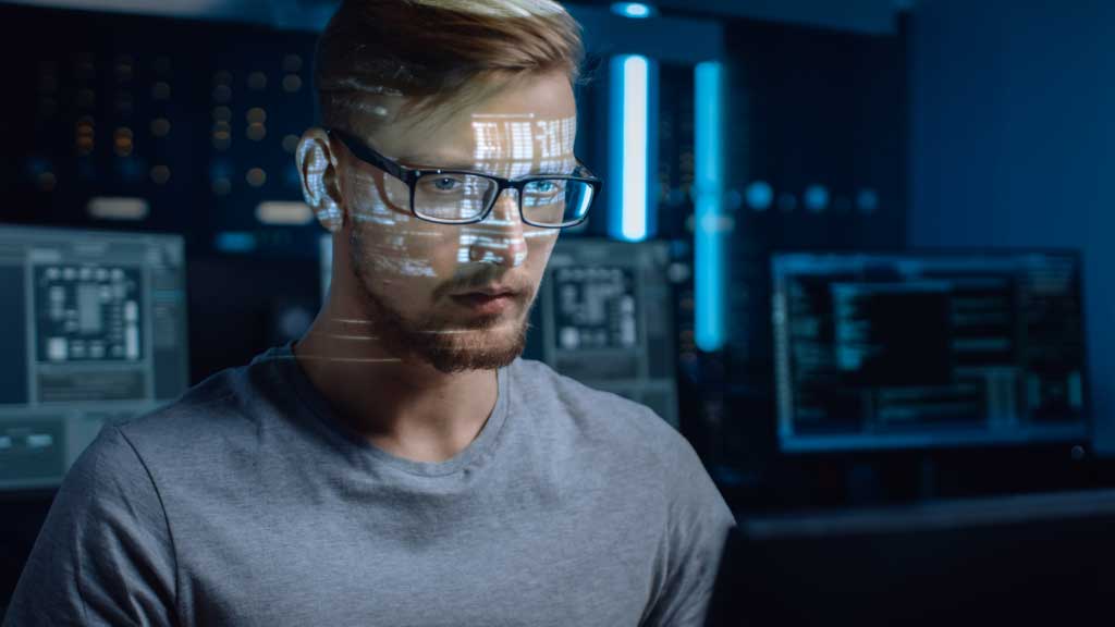 Cybersecurity-worker-at-desk